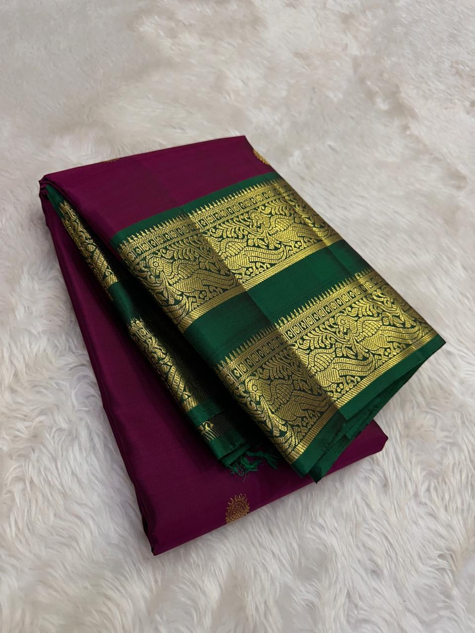 Antique gold zari bottle green rettapet border on bright berry pink Kanchipuram silk saree Idam Living
