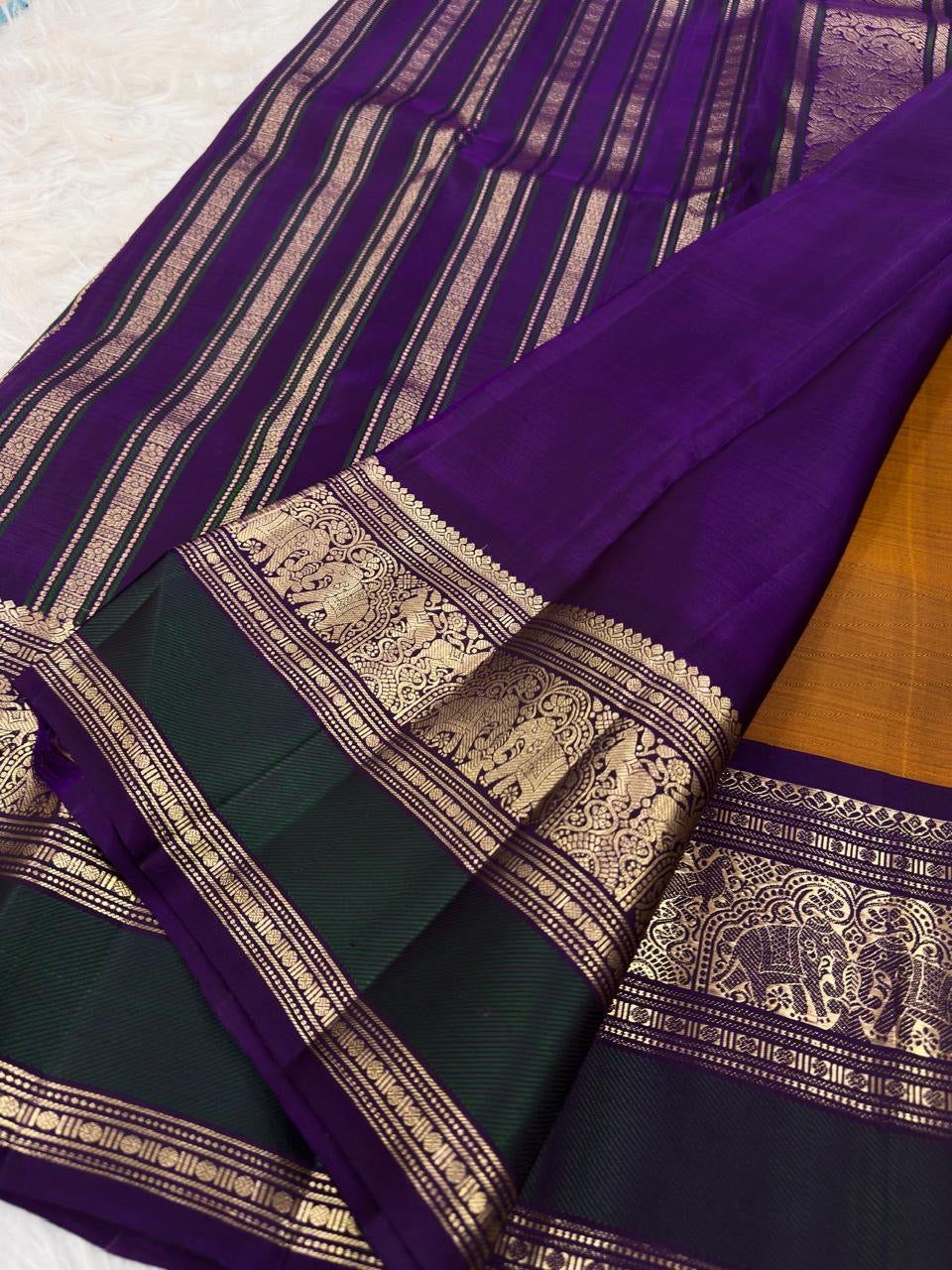 Antique Mustard Gold Kancheepuram Saree — body close-up showing scattered gold zari buttas