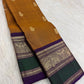 Antique Mustard Gold Kancheepuram Saree — royal-purple and emerald-green border with elephant and peacock motifs