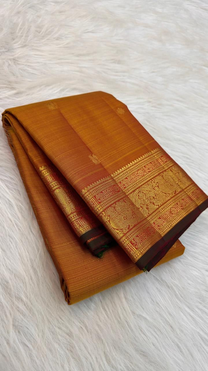 Burnished Ochre Gold Handwoven Pure Silk Kanjeevaram Vairaoosi Saree with Gold Zari Buttas and Traditional Zari Border