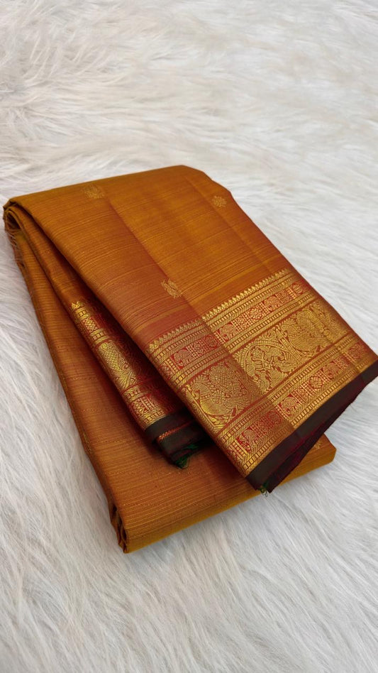 Burnished Ochre Gold Handwoven Pure Silk Kanjeevaram Vairaoosi Saree with Gold Zari Buttas and Traditional Zari Border