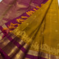 Mustard Gold Kanjivaram saree with intricately woven ceremonial procession motifs