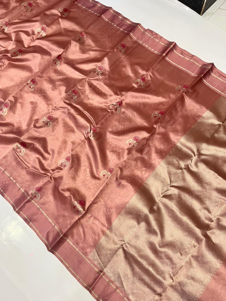 Antique Rose Pattu Silk Chanderi saree folded lengthwise showing soft sheen and restrained border detailing