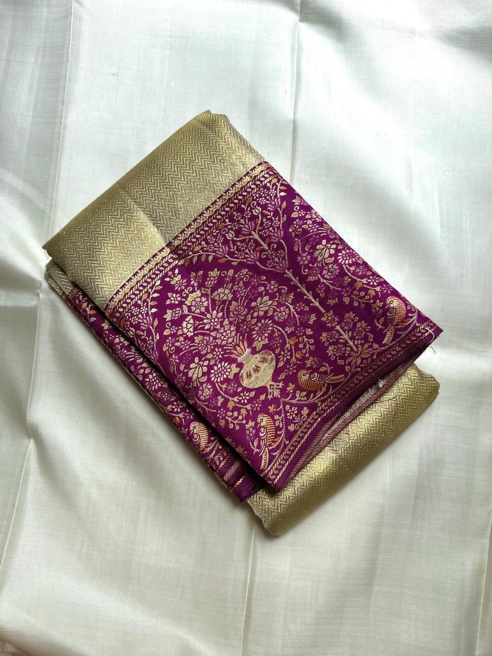 Antique Sage Gold pure silk Kanjeevaram Butta saree with Kanchana Purple Banarasi-style floral jaal zari border.