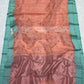 Rose-toned metallic pallu on peach Chanderi
