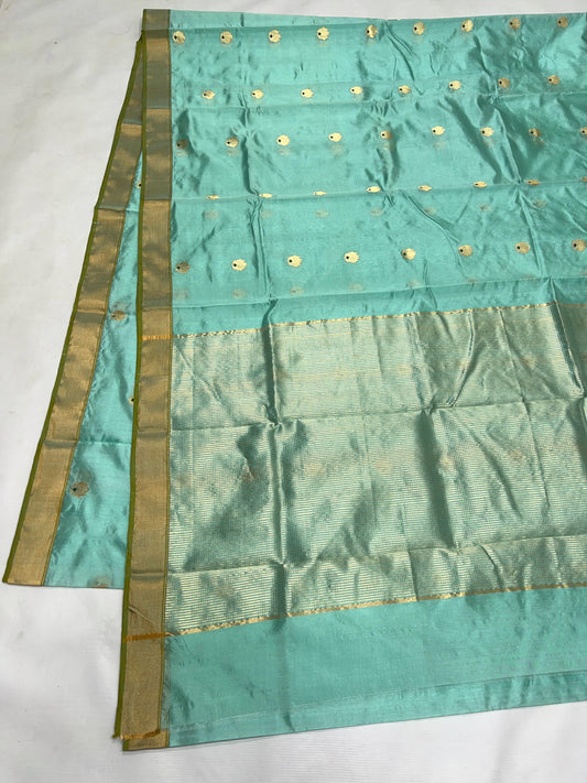 Aqua Blue handloom Chanderi silk saree with gold buttas, olive green edged border and pale metallic woven pallu