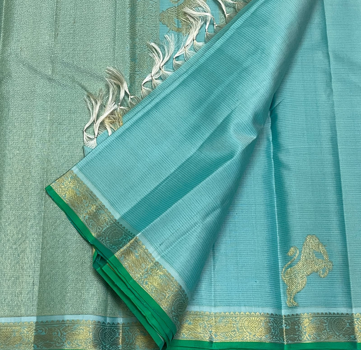 Aqua Blue Kanjivaram silk saree with Emerald Green border