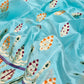 Aqua blue Chanderi silk saree showing multicolour ornamental woven border and luminous metallic pallu