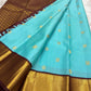 Aqua Blue Pure Silk Kanchipuram Korvai saree body with gold-zari buttas.