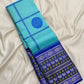 Folded aqua blue handwoven Pure Silk Kanchipuram Pattupet saree.