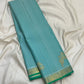 Light aqua blue Kanchipuram silk saree with fine continuous Vairaoosi zari lines.