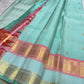 Sea-Glass Aqua Handwoven Pure Silk Kanchipuram Saree with Coral-Rose Rettapet Border and Gold Zari Buttas