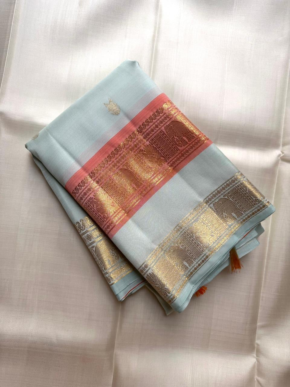 Sea Glass Aqua Handwoven Pure Silk KanchiPattu Saree with Dusty Rose Rettapet Zari Border