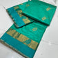 Turquoise Green Chanderi saree pallu detail, broad antique-gold woven field with turquoise and gold bands