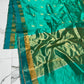 Full view of Turquoise Green Pattu Silk Chanderi with rows of woven bird motifs and luminous antique-gold pallu