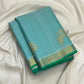 Aqua Blue Vairaoosi saree with delicate gold zari border and fresh green selvedge.