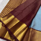 Gold-zari buttas spaced across Aqua Blue Kanchipuram silk.