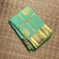Aqua Mint Kanjivaram silk saree with Pale Gold zari border.