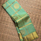 Aqua Mint Pure Silk Kanchipuram Zari Kattam saree.