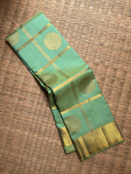 Aqua Mint Pure Silk Kanchipuram Zari Kattam saree.