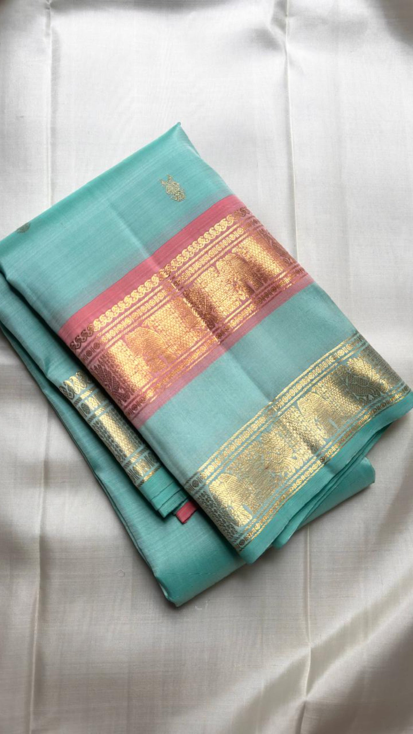 Sea-Glass Aqua Handwoven Pure Silk Kanchipuram Saree with Coral-Rose Rettapet Border and Gold Zari Buttas