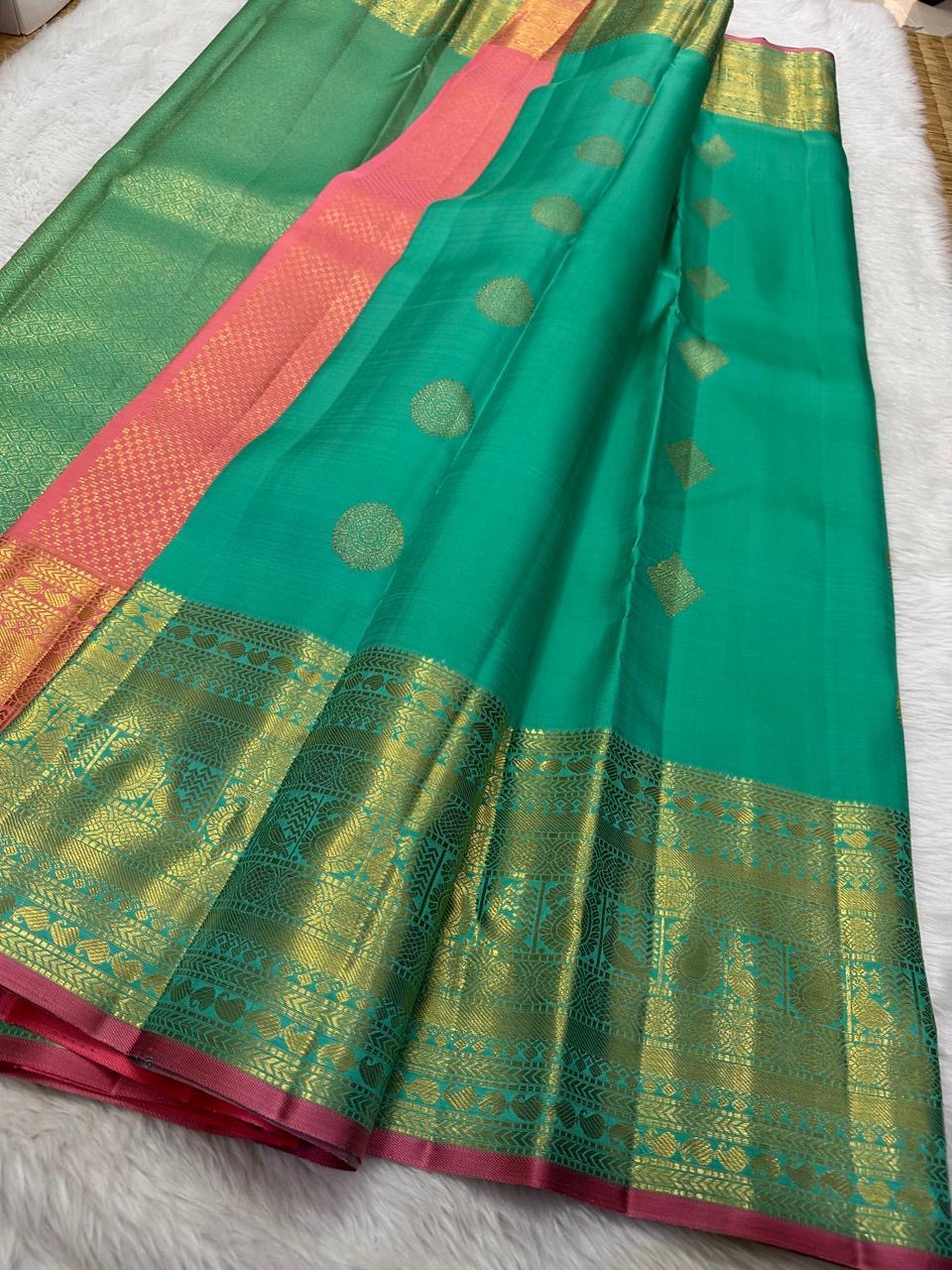 Aqua shot-colour silk catching the light, Kanchi Pattu Butta saree