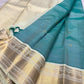 Aqua Teal Pure Silk Kanchipuram Korvai saree with Warm Ivory gold zari border
