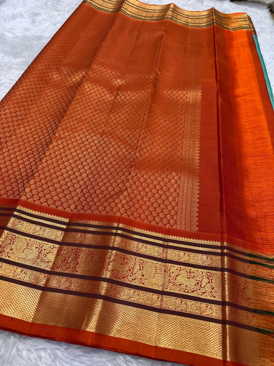 Aqua Turquoise Pure Silk Kanchipuram Varisaipet saree with Burnt Orange zari border