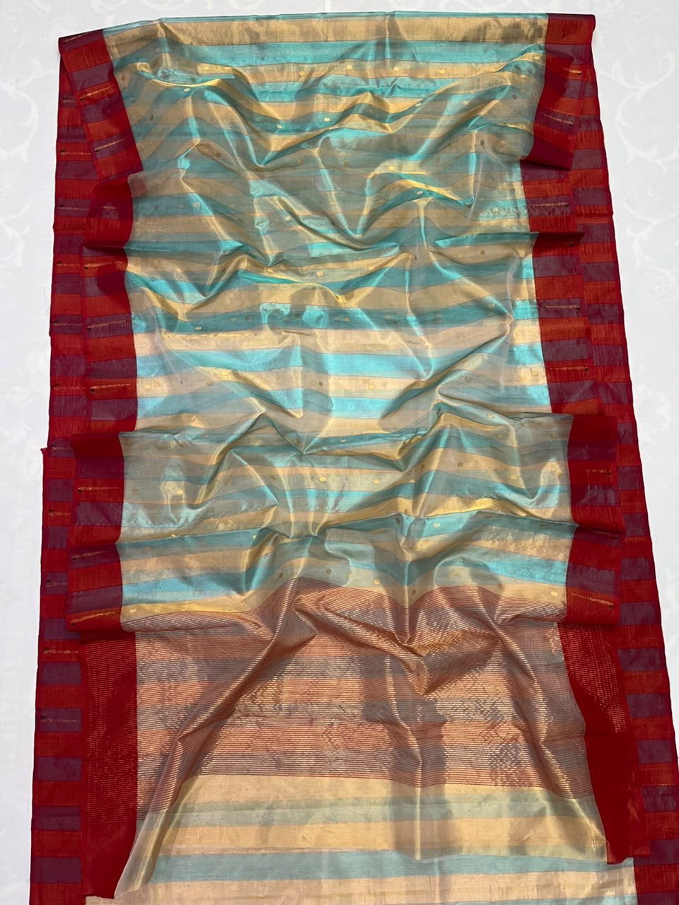 Metallic woven pallu of blue and gold Chanderi saree