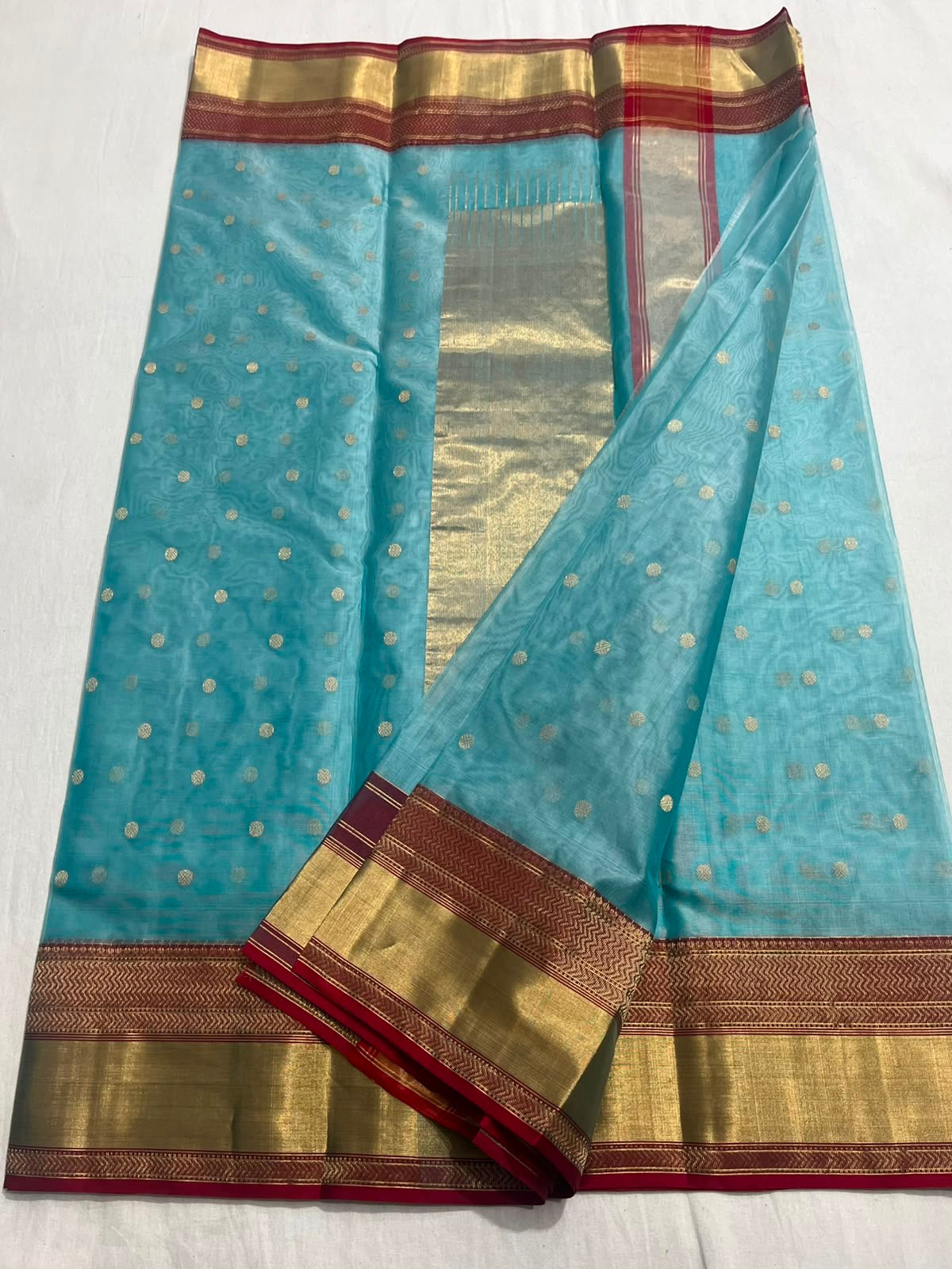 Aquamarine-blue Katan Silk Chanderi with gold-toned border