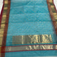 Antique-gold-toned border with deep-red details