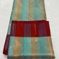 Deep-red border on aquamarine and gold Chanderi saree