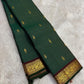 Arakku-Brown Kanchipuram border with Yaanai and Kodi-Valli gold zari motifs