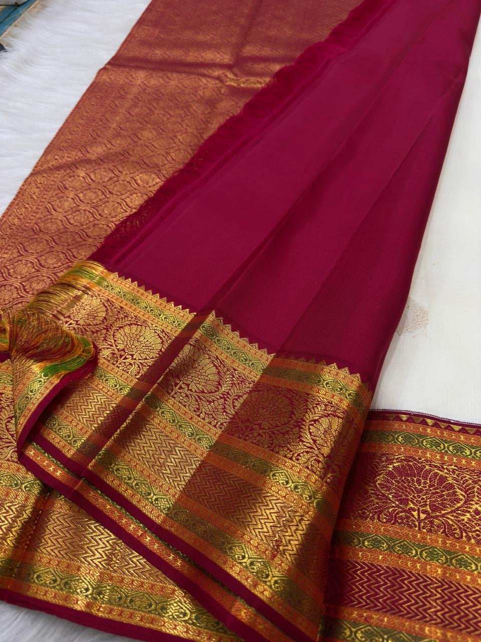 Banarasi-inspired ornate floral gold brocade in the Arakku Kanchipuram border