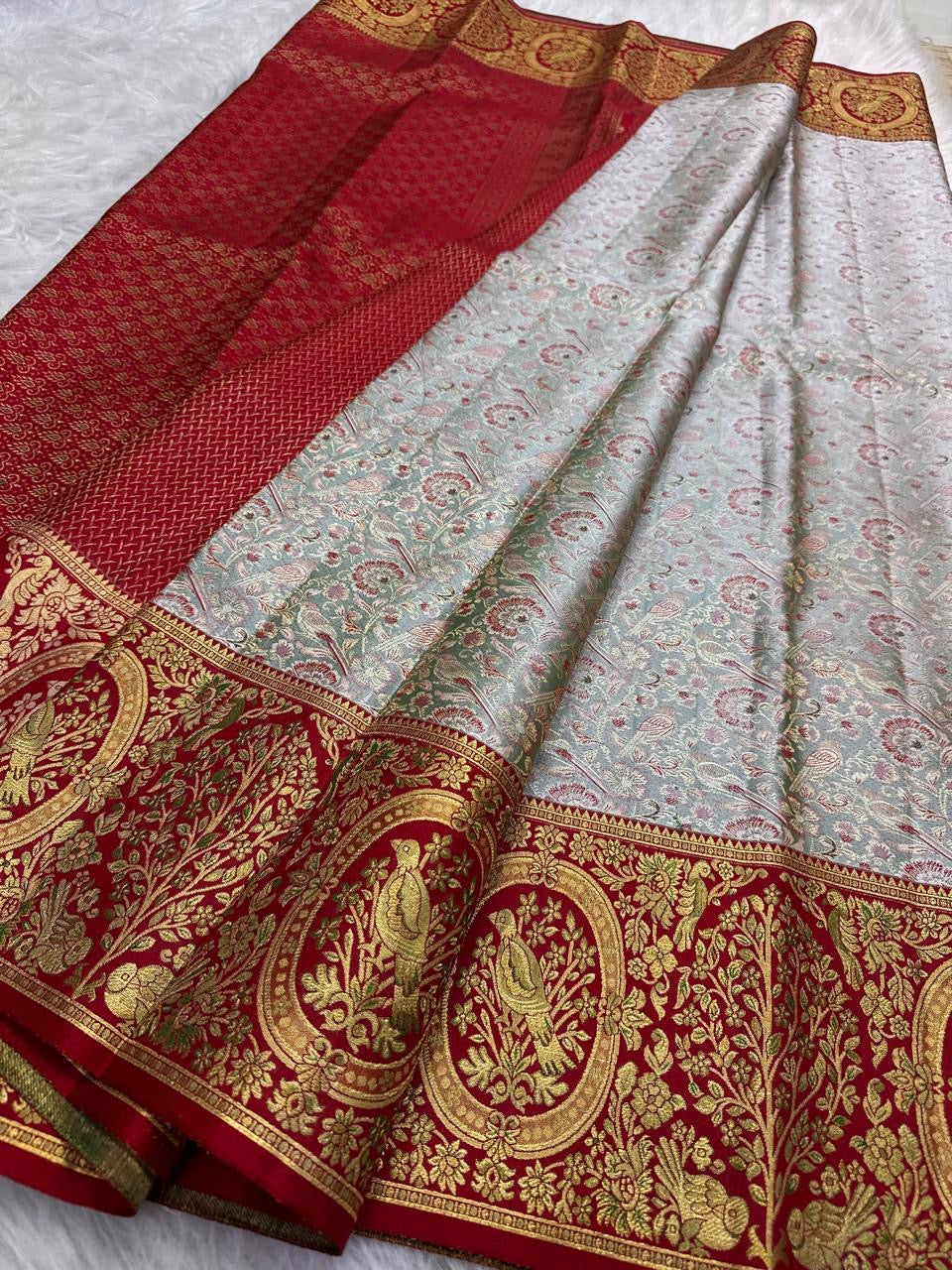 Close view of dense floral jaal-style weaving across Silver Grey pure mulberry silk Kanchi saree.