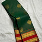 Handwoven bottle green pure silk Kanjivaram saree with gandaberunda motif and arakku red border — Idam Living