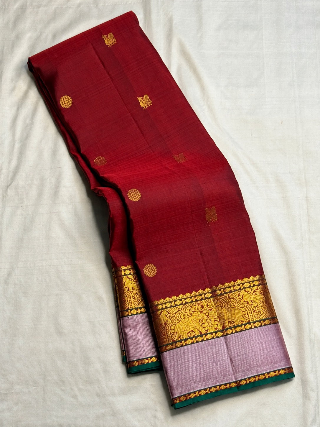 Deep Arakku red butta pure silk Kanjipuram saree with elephant zari and mauve border – view 1