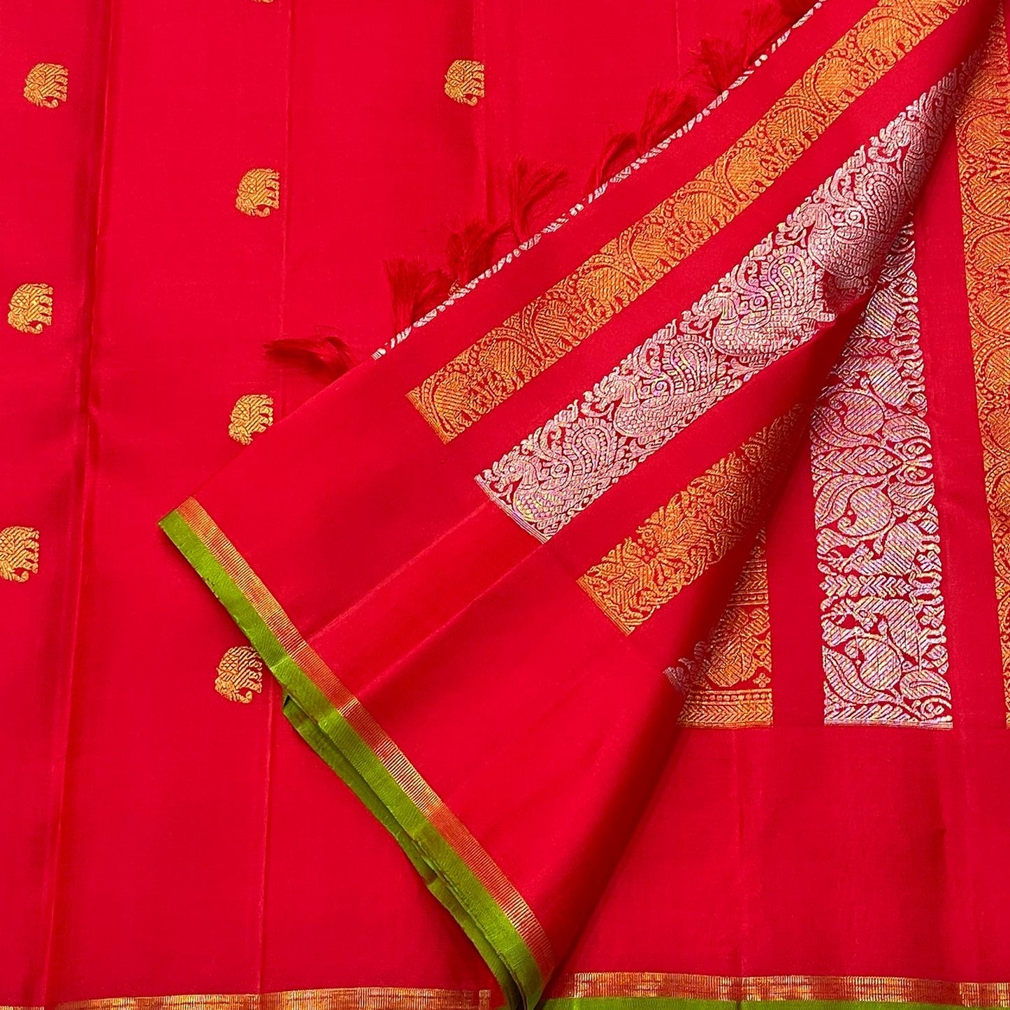 Striking Red Handwoven Pure Silk Kanjivaram Saree with Floral Jaal Butta Border