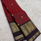 Arakku Red and Deep Maroon Handwoven Pure Silk Kanjeevaram Saree with Mayil Butta and Vanasringaram Silk Thread Border