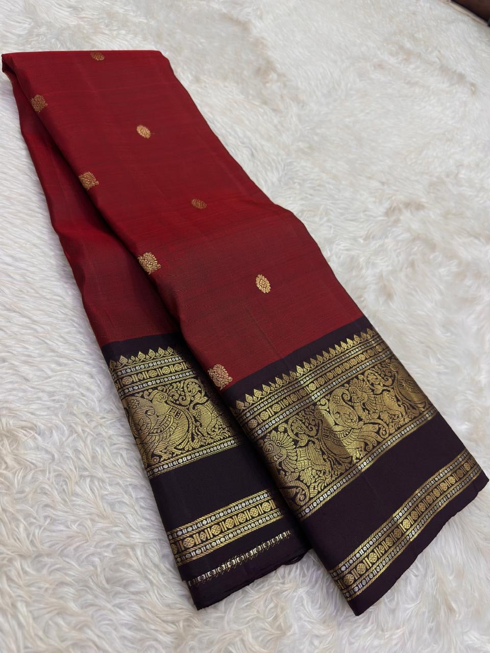 Arakku Red and Deep Maroon Handwoven Pure Silk Kanjeevaram Saree with Mayil Butta and Vanasringaram Silk Thread Border