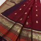 Deep Aubergine Varisaipet border with large Yaanai gold zari motifs on Arakku Red pure silk saree.