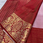 Close view of tone-intensive floral jaal weaving across Pearl Ivory pure mulberry silk Kanjivaram saree.