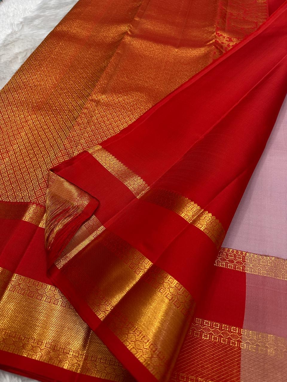 Brick Red Kamalam and Kodi vine gold zari border on Kanchipuram silk