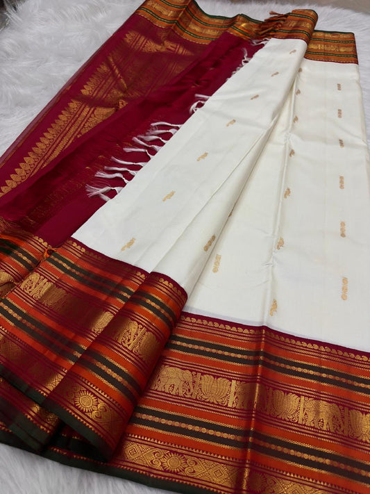 Arakku Red Kanchipuram pallu with dense diamond-Kattam gold zari and ornamental bird registers