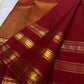 Arakku Red pure silk Kanchipuram body with spaced gold zari buttas