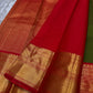 Arakku Red Korvai border with warm gold zari and Reku detailing.