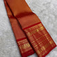 Handwoven pure silk Kanjipuram saree in rust orange with Korvai Vairaoosi diagonal zari stripe body and arakku red Korvai Yaanai Annam antique gold zari border Silk Mark certified
