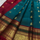 Arakku red pallu with circular gold zari medallions and a long ornamental panel