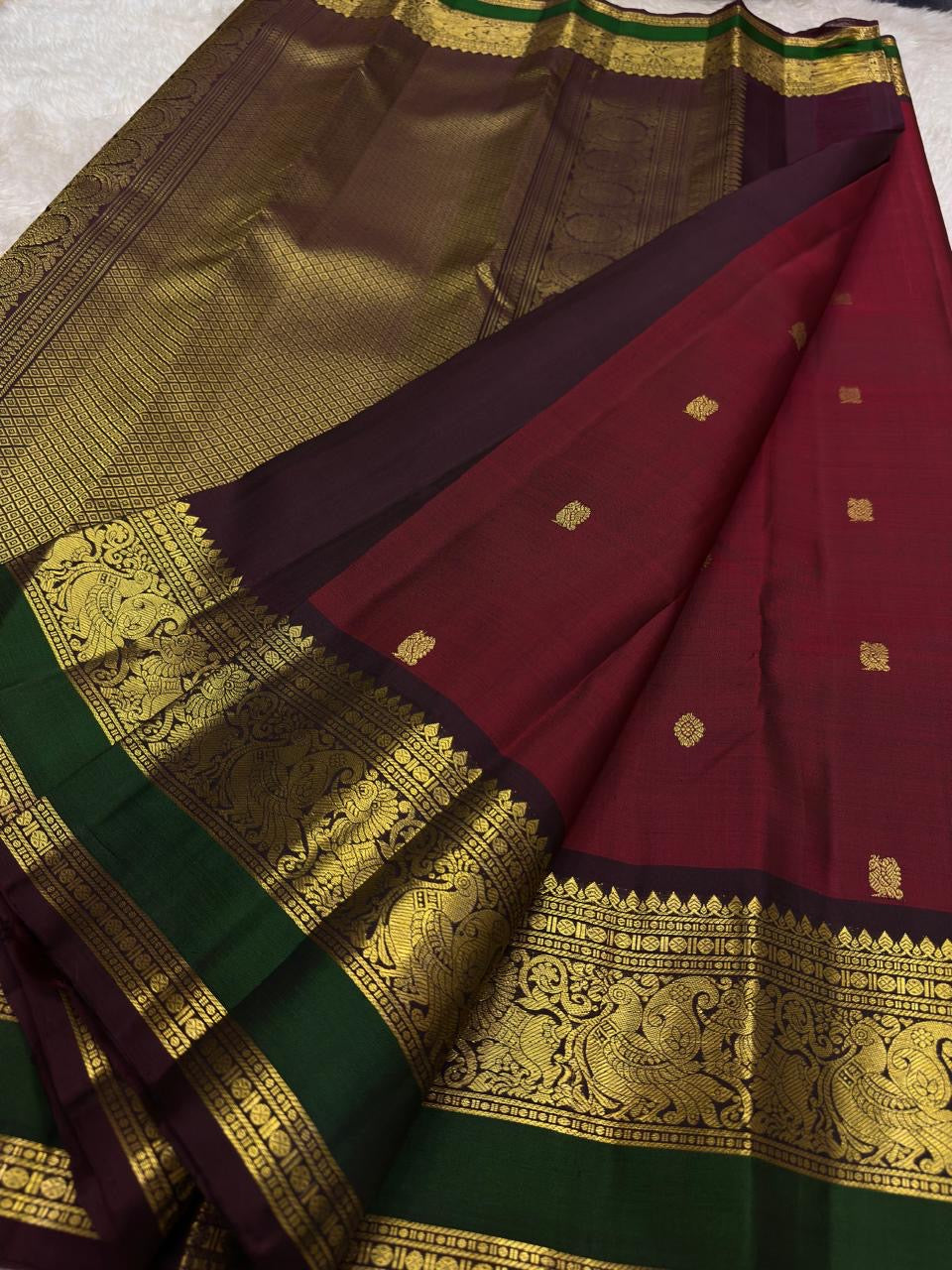 Arakku Red and Deep Green Handwoven Pure Silk Kanchi Pattu Saree with Kamalam Mayil Butta and Silk Thread Zari Border