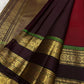 Arakku red body detail showing larger gold zari buttas.